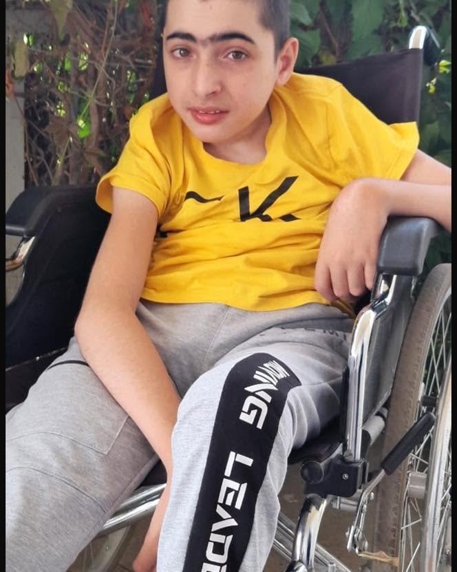 Young patient in a wheelchair supported through a VIVA Foundation healthcare programme